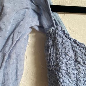 Blue crop top with off the shoulder sleeves